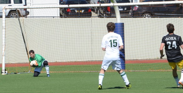 Goalkeeper Nick Meola saves easily.
